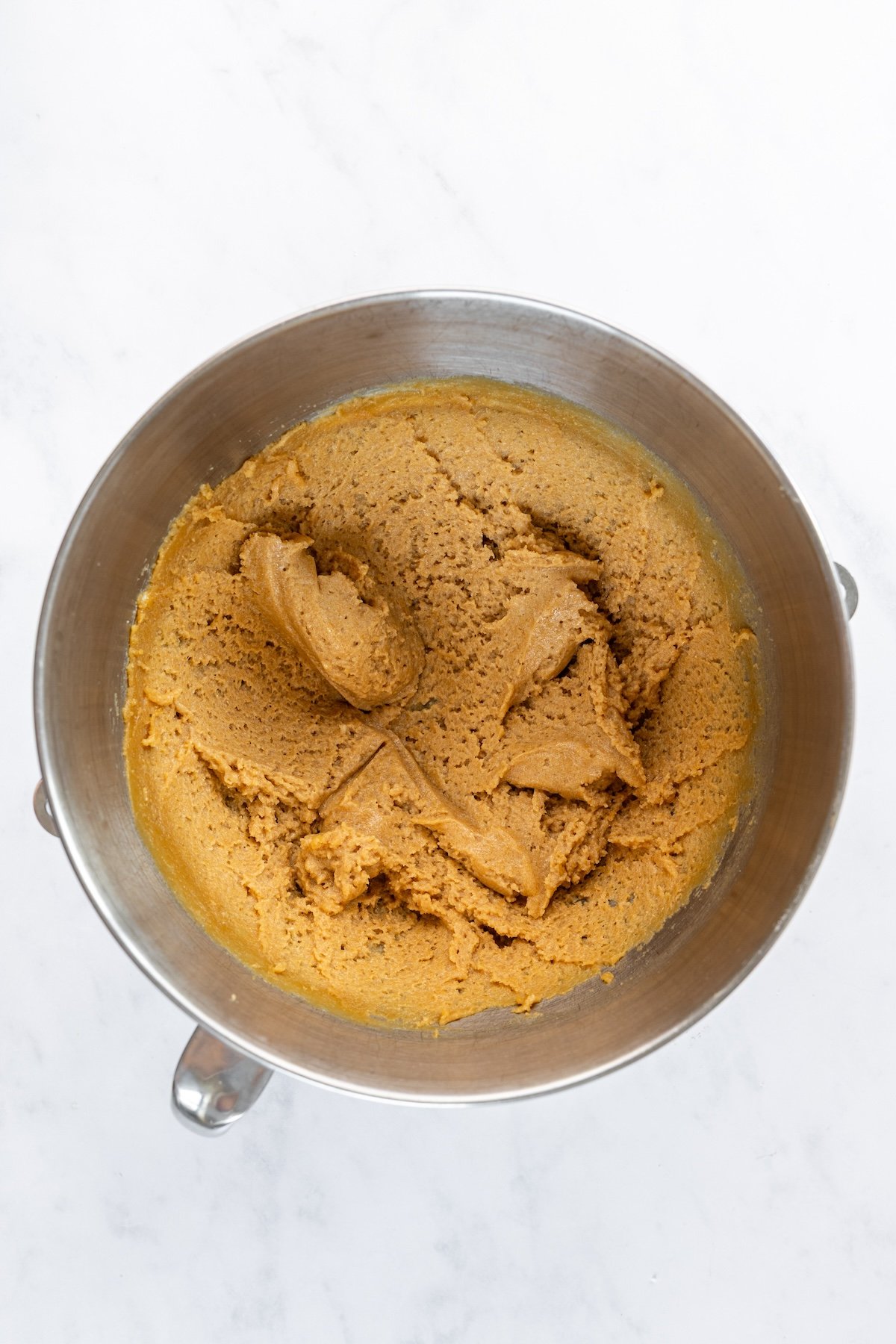 mixing bowl with well-combined mixture of cream cheese, peanut butter, sugar, and vanilla