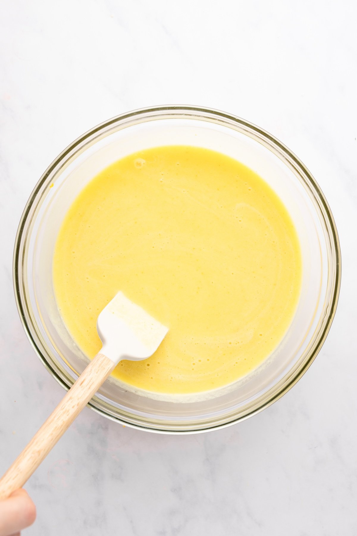glass bowl with golden gazpacho