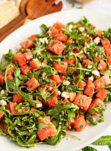 watermelon feta salad on white oval serving platter