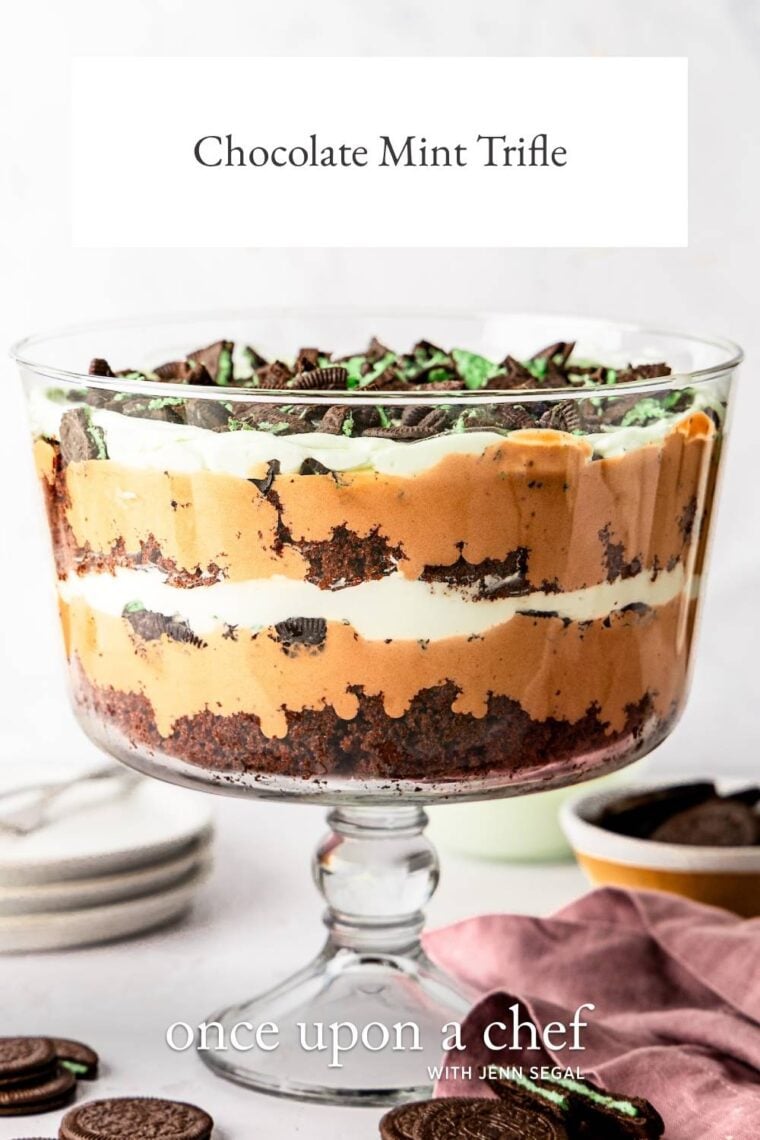 chocolate mint trifle in trifle dish surrounded by chocolate mint cookies