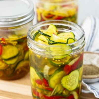 3 jars filled with bread and butter pickles
