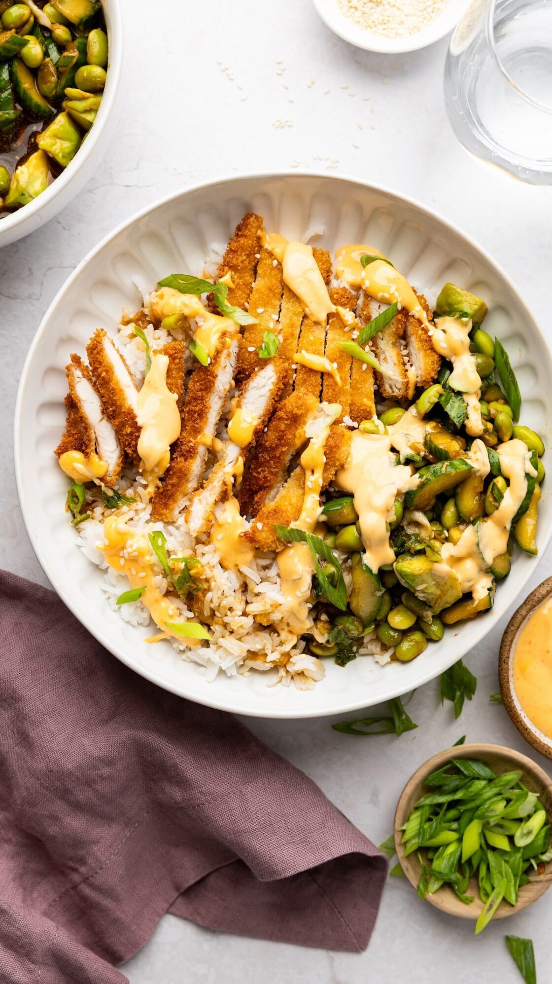 chicken katsu bowl with sriracha mayo on side