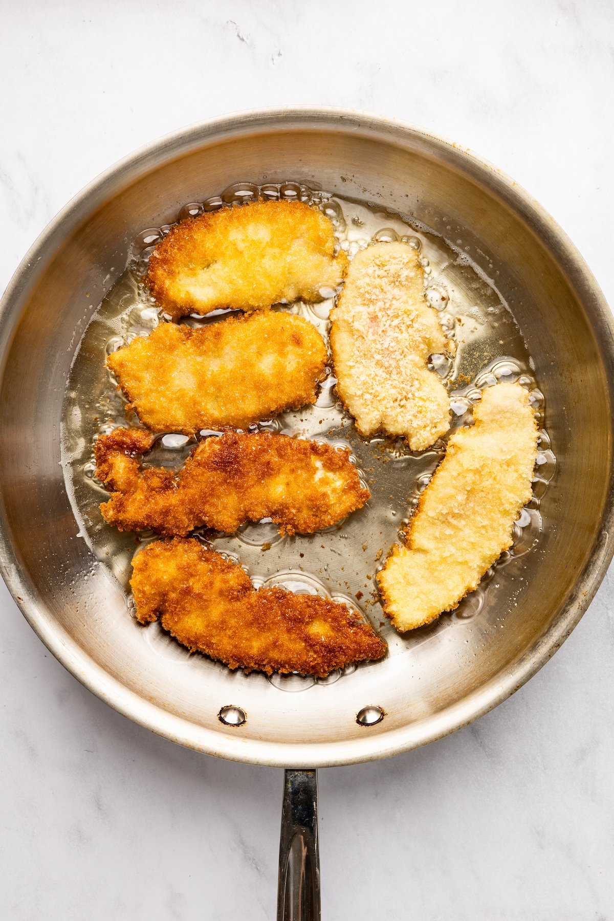 cooking chicken in skillet
