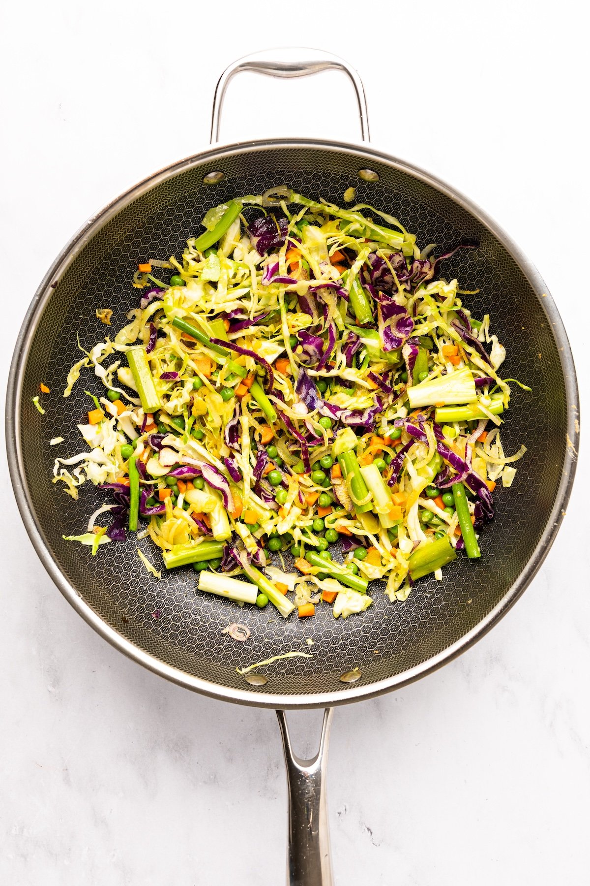 nonstick garlic, ginger and shallots with cooked scallions, vegetables, and turmeric