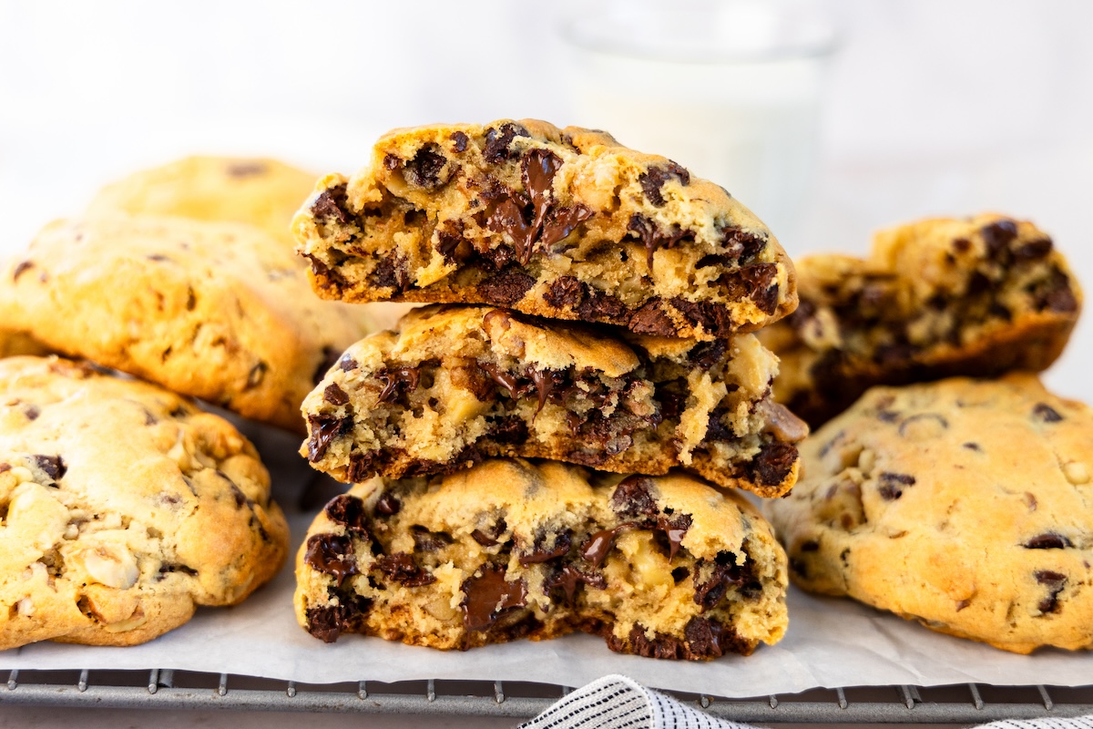 levain chocolate chip cookies stacked on rack
