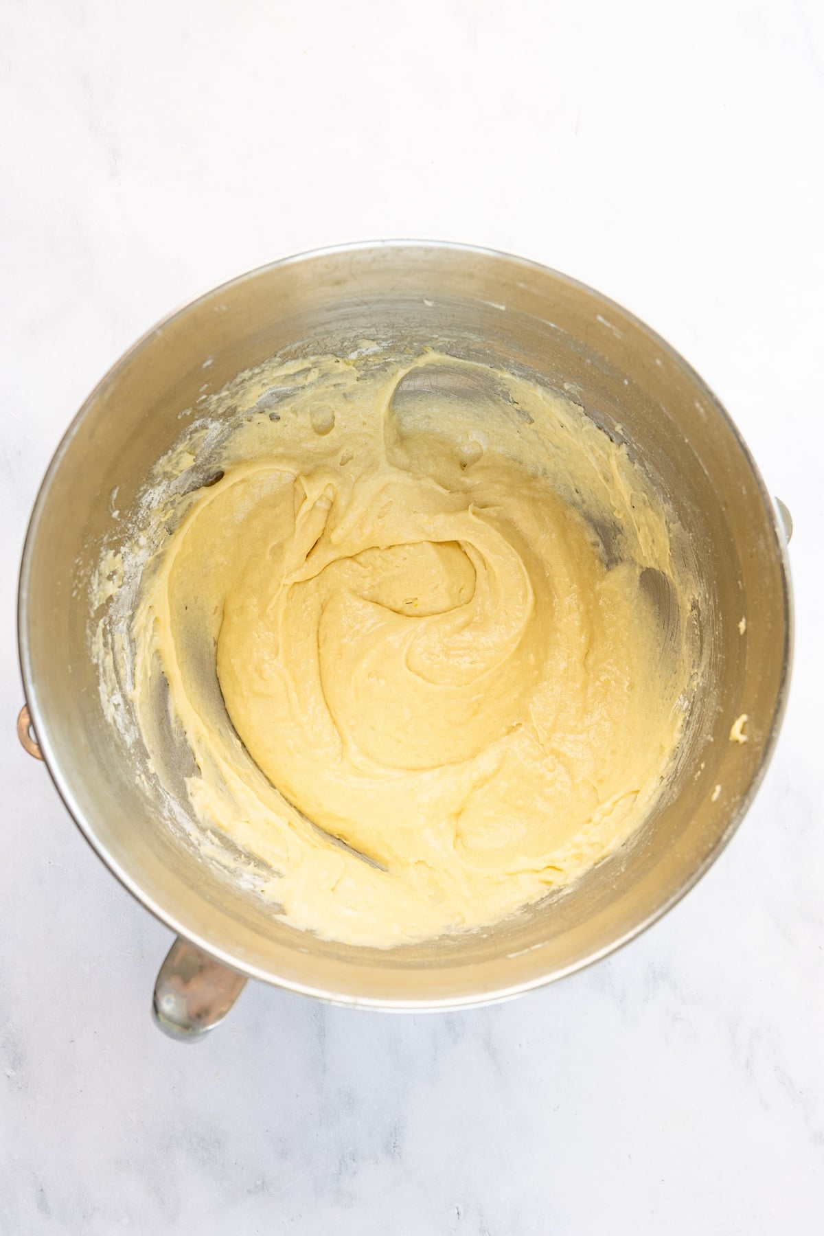 mixing bowl with cake batter fully mixed