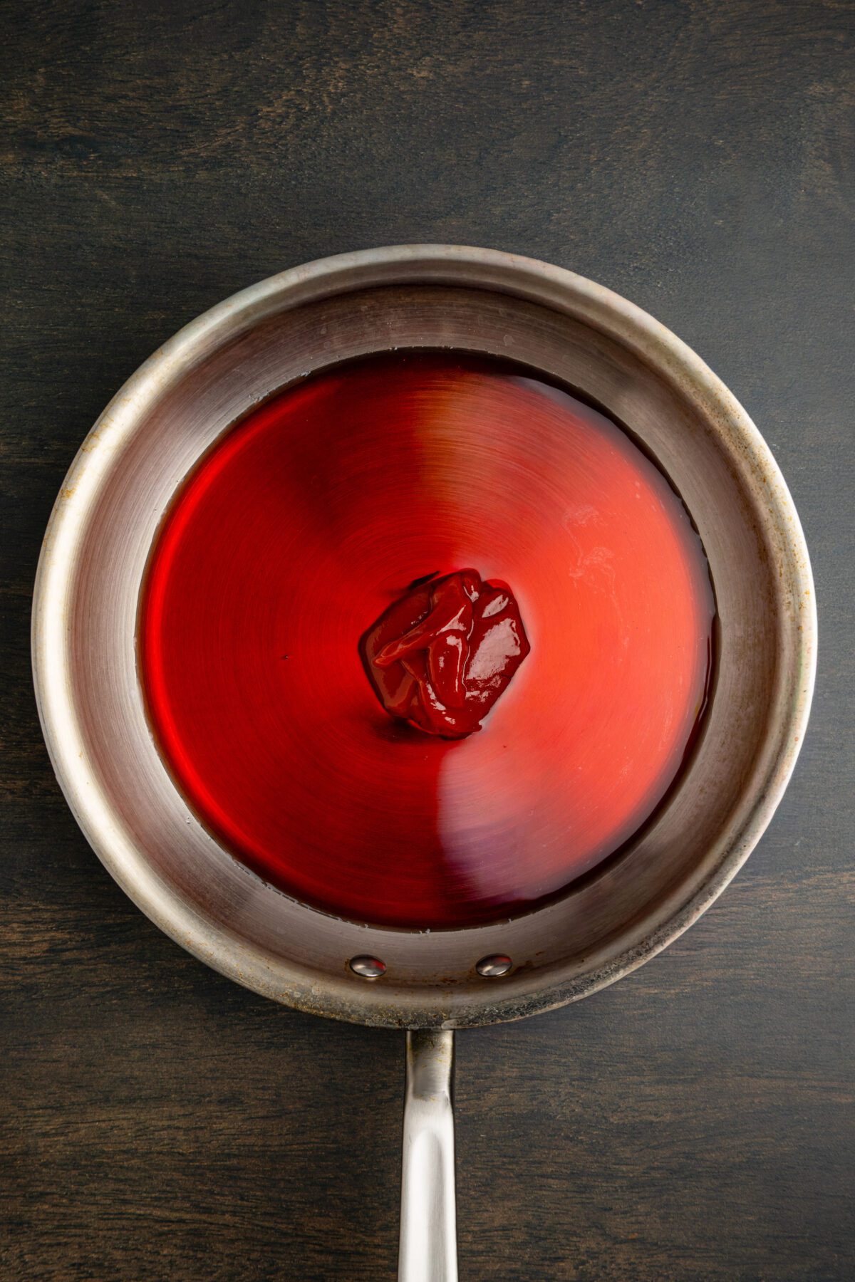 juice and ketchup in a medium skillet