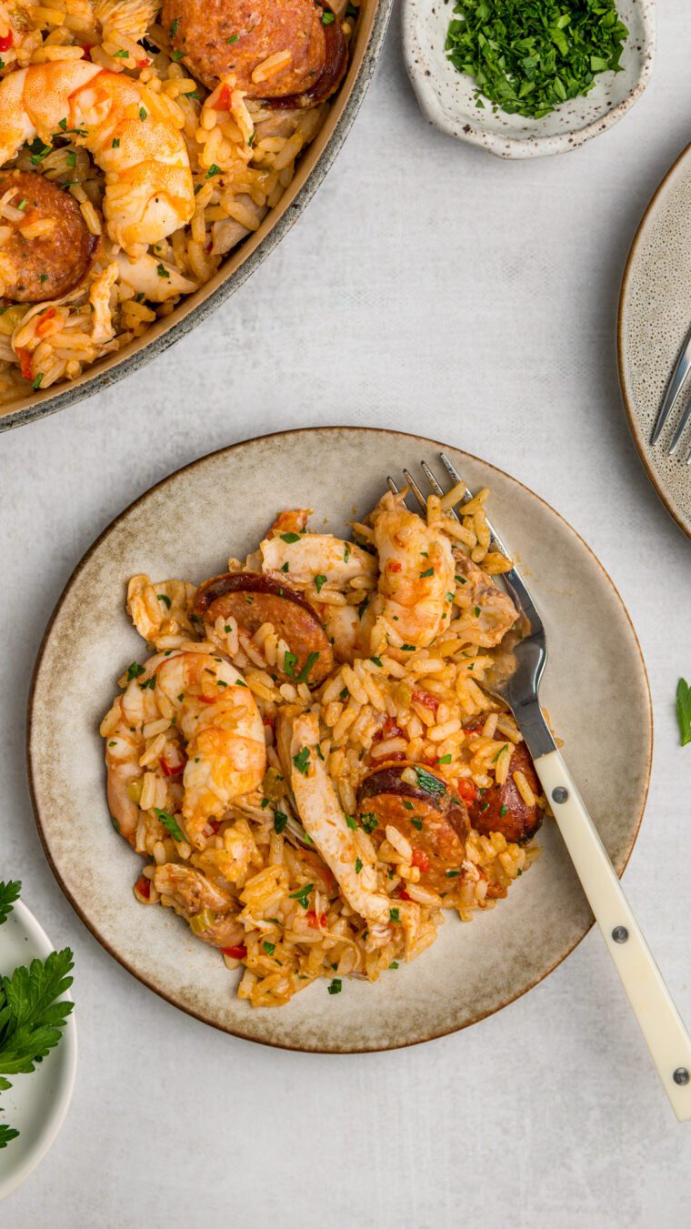 jambalaya on grey plate with fork