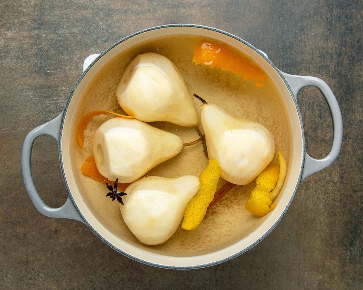 pears poaching in pot
