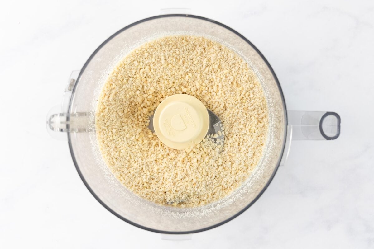chopped almonds in food processor bowl