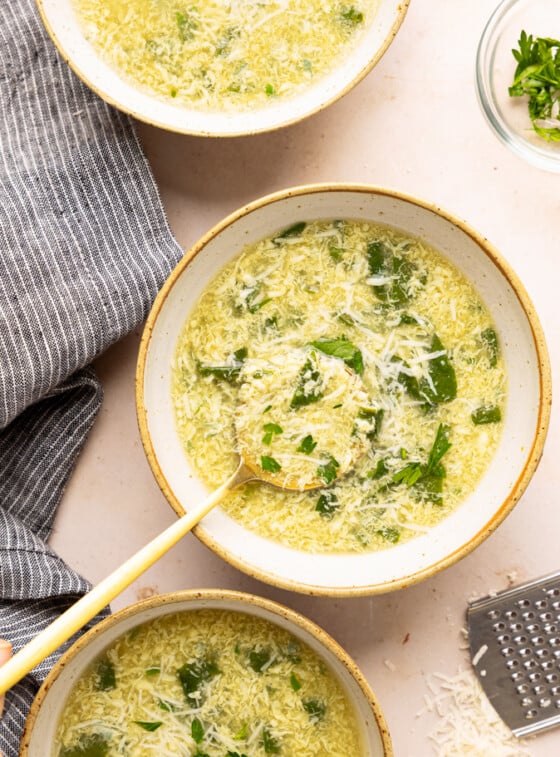 stracciatella soup in bowls