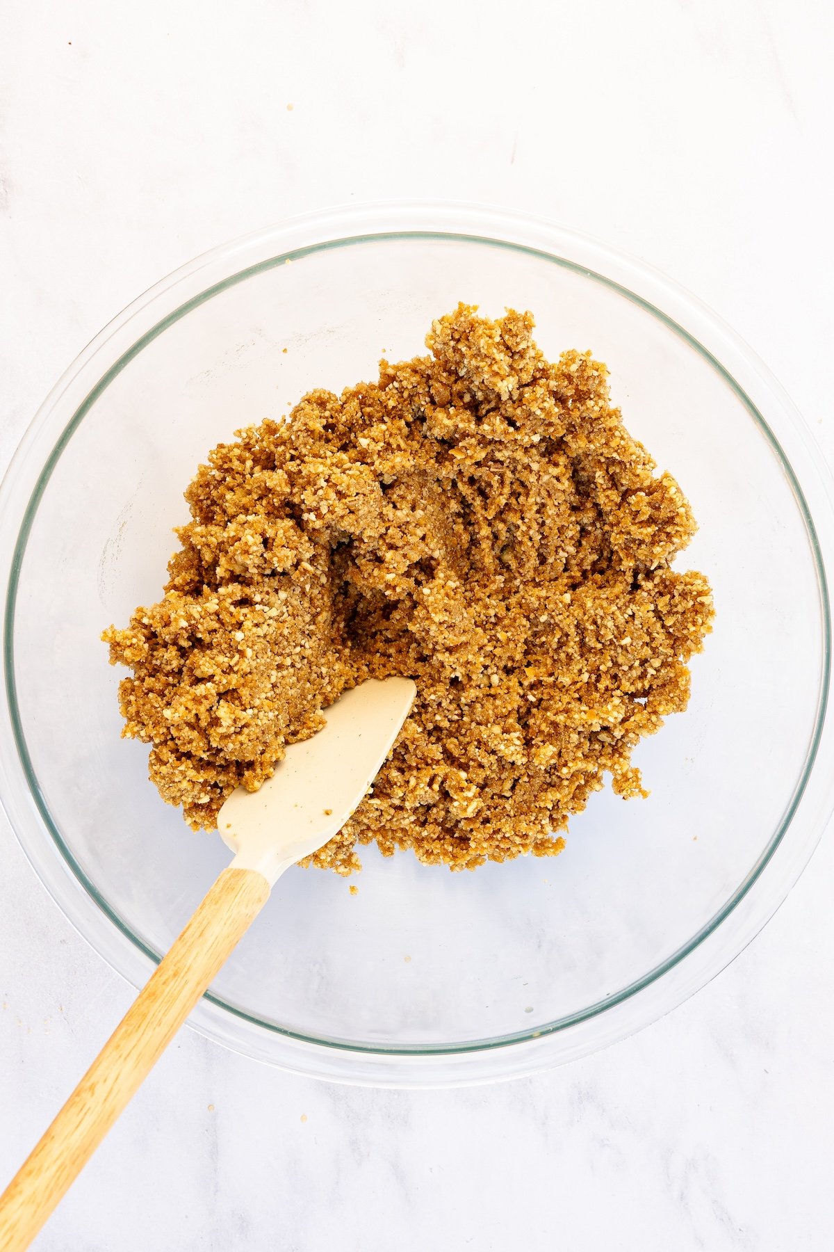 rum ball mixture mixed together in glass bowl