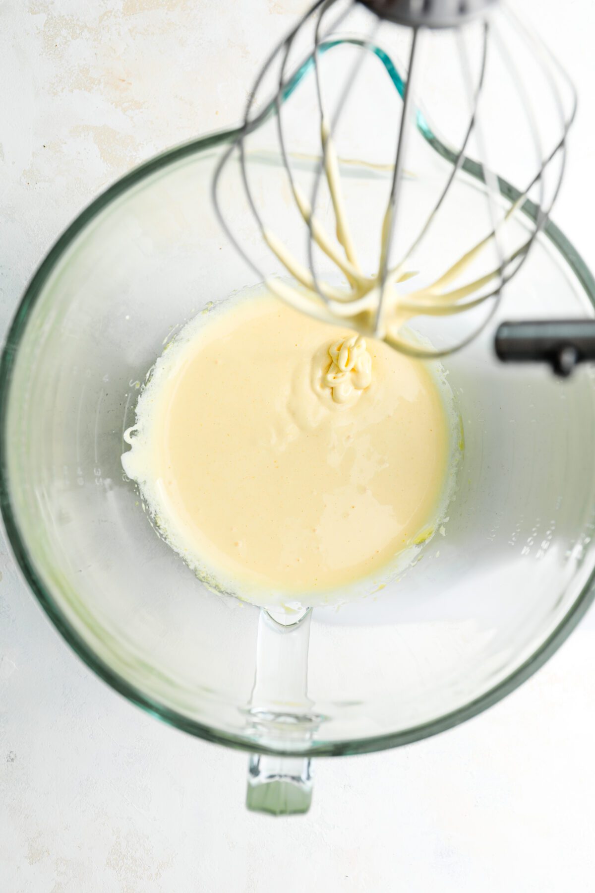 mixing bowl with egg yolk and sugar mixture