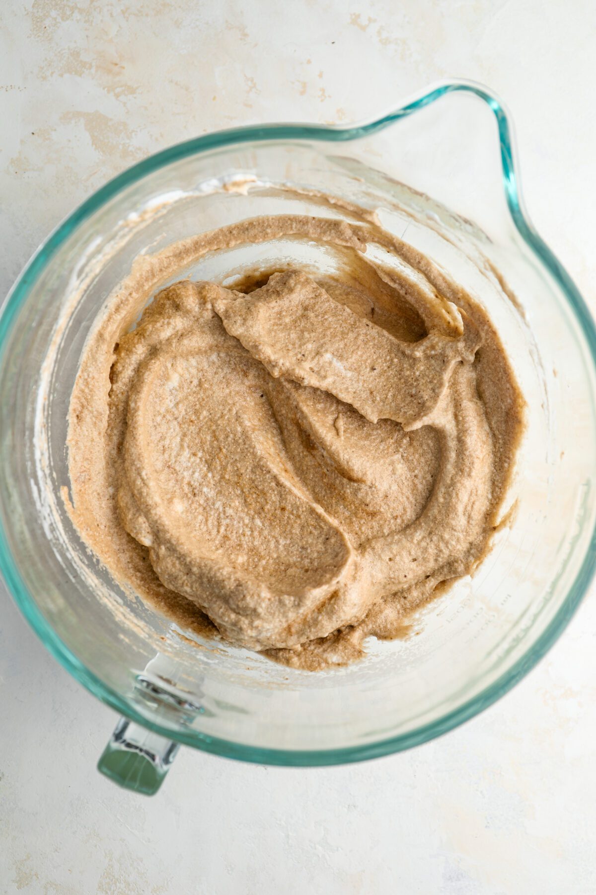 combining the egg yolk mixture and beaten egg whites