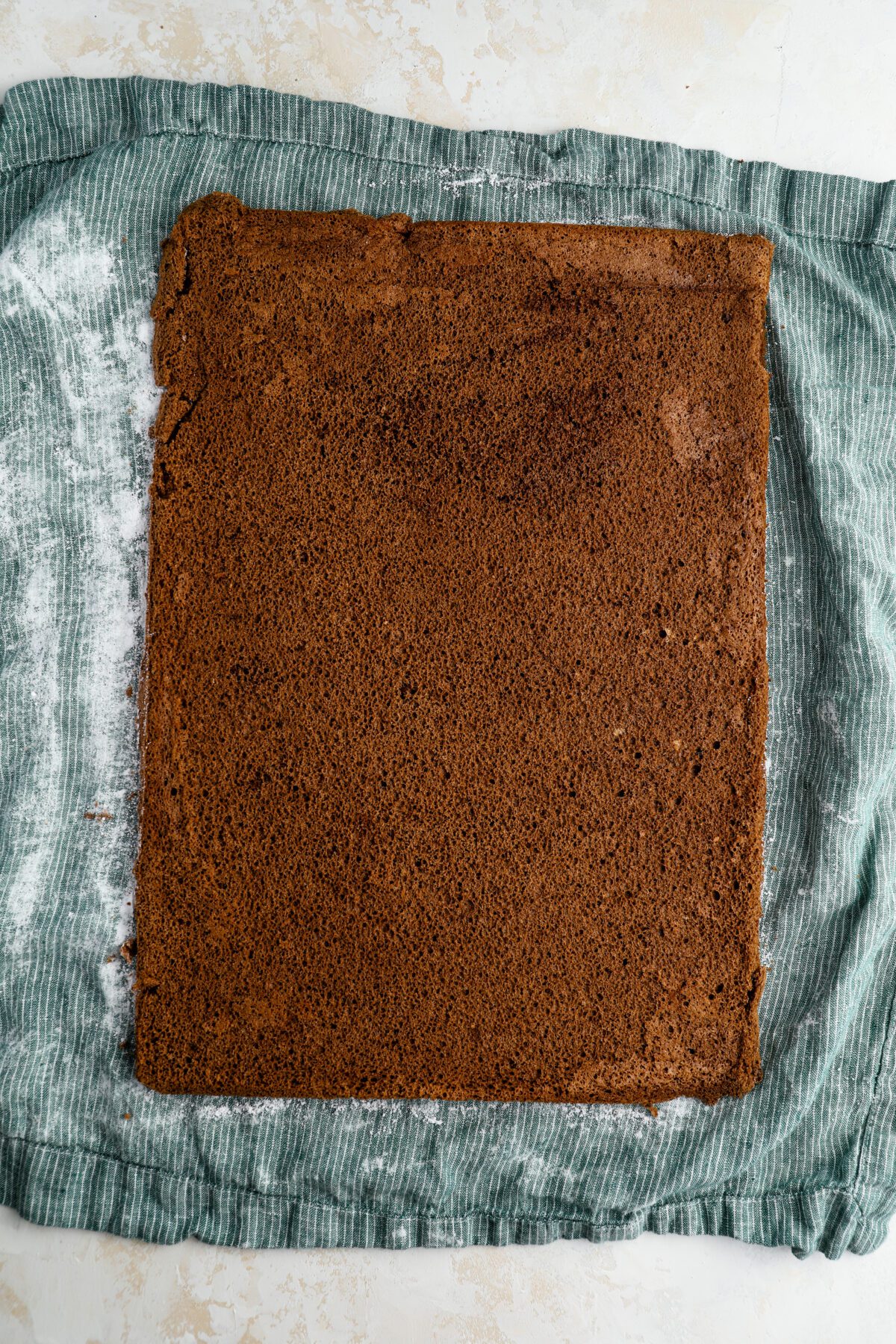 baked cake on clean kitchen towel