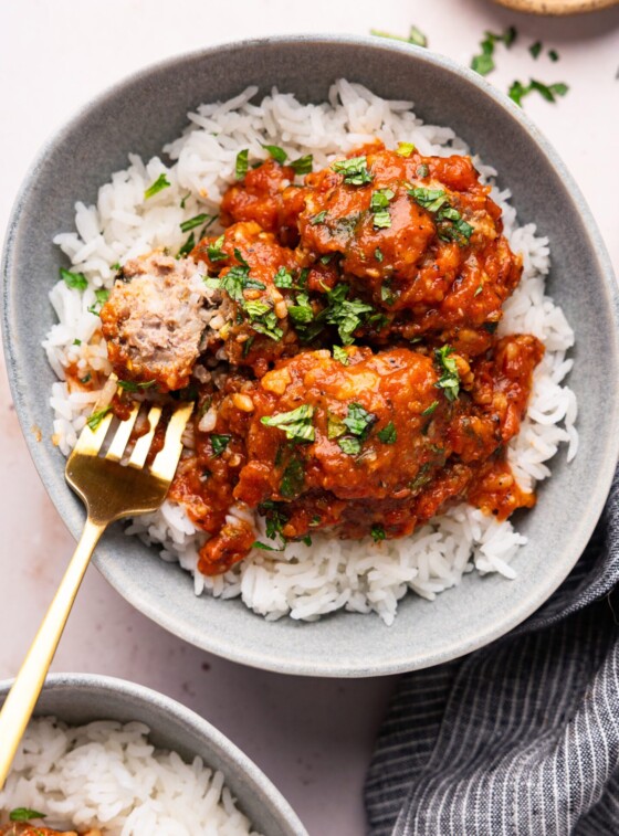 albondigas in bowl over rice