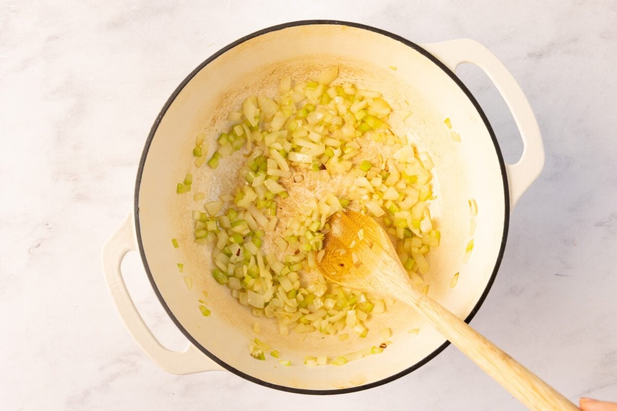 onions and celery cooking in Dutch oven