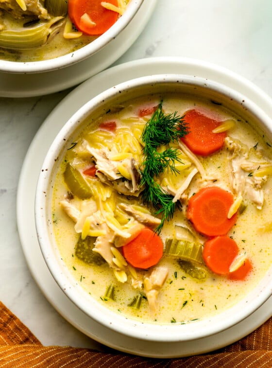 bowls of lemon chicken orzo soup