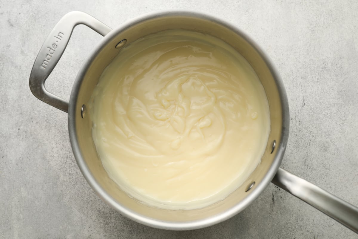 medium sauce pan with thickened custard