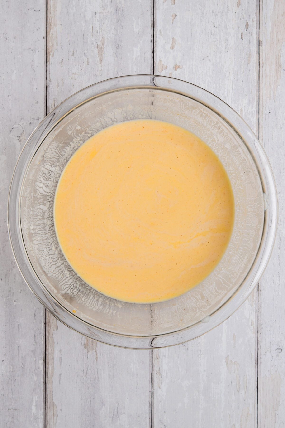 large bowl with eggs mixed into brine