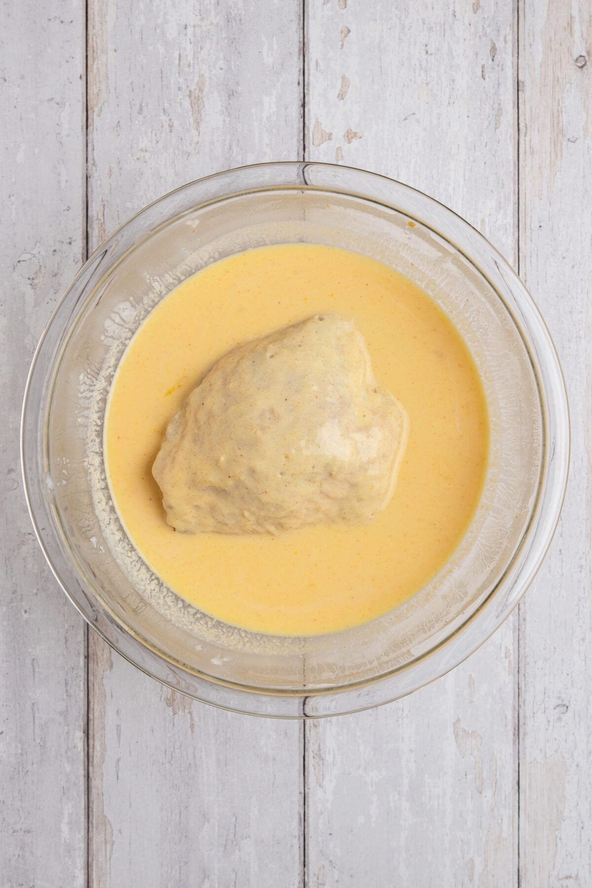 breaded chicken dipped in brine/egg mixture