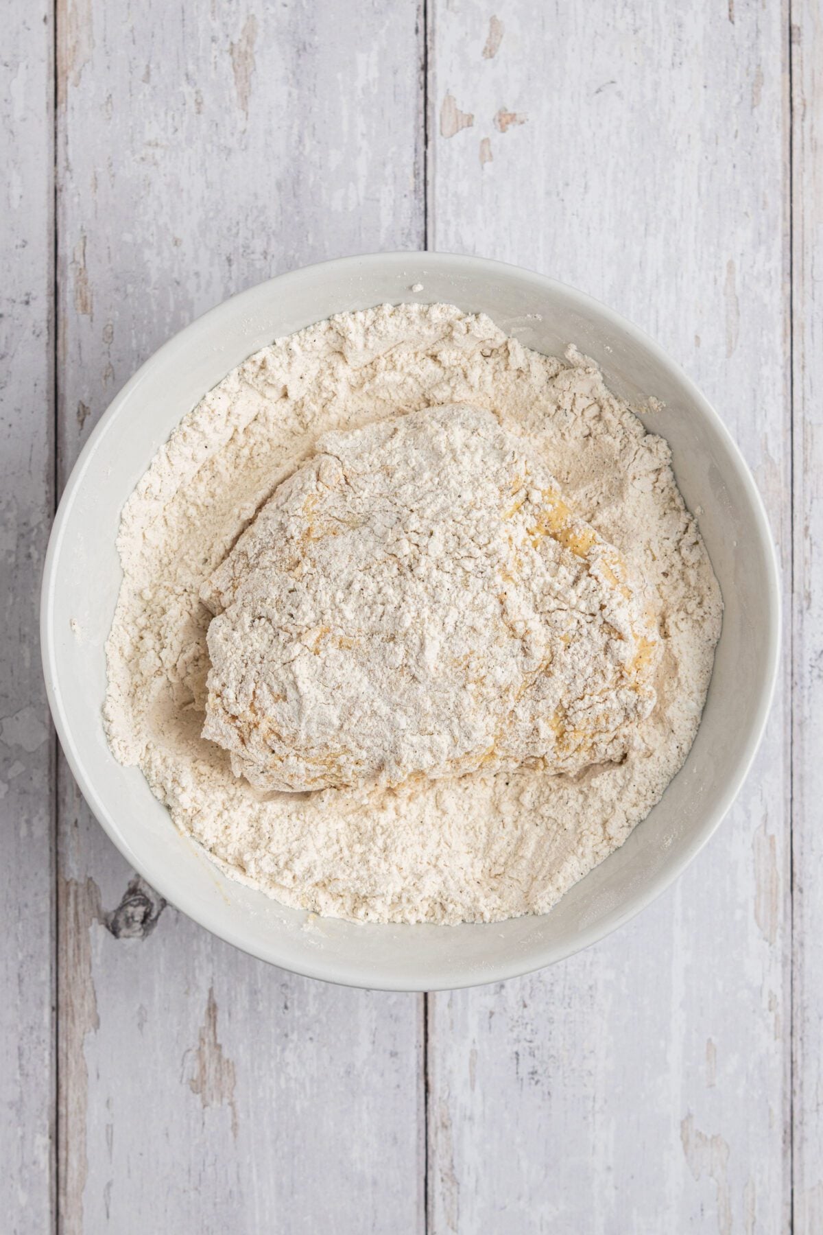 chicken dipped in second round of flour mixture