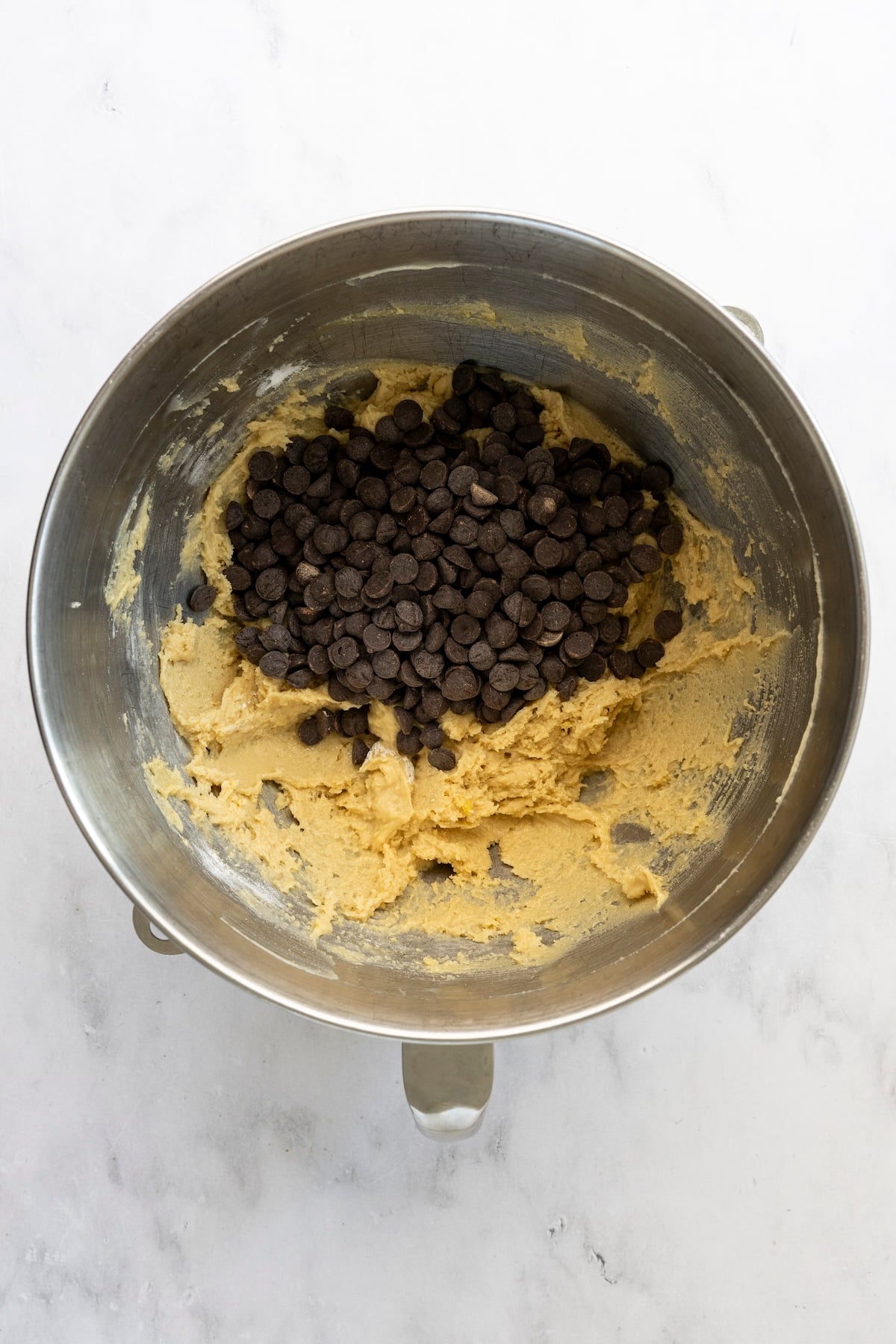 mixing bowl with chocolate chips added to batter