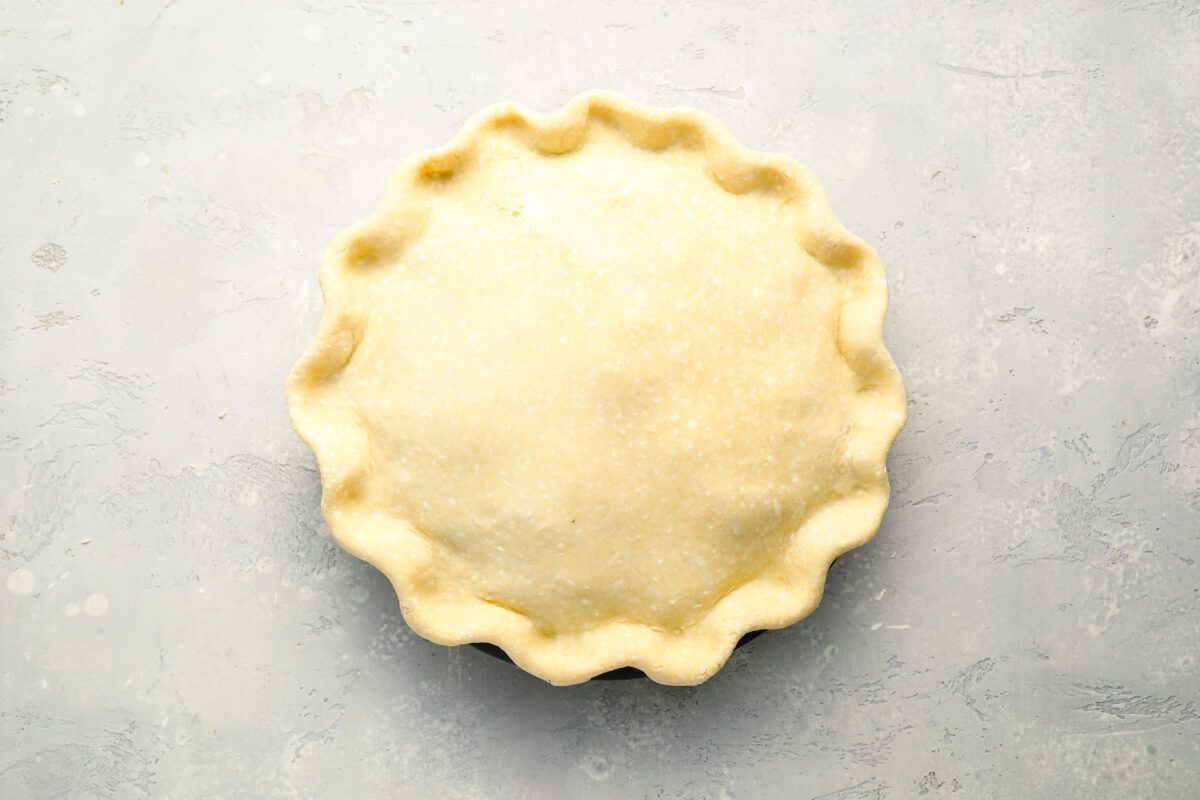 Crimped assembled apple pie.