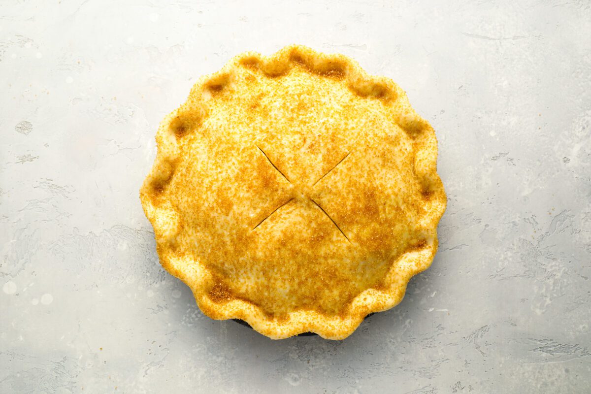 Assembled apple pie ready to bake.