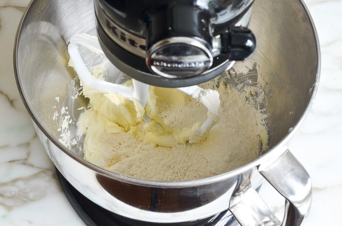 ingredients for chocolate tart dough in stand mixer bowl.