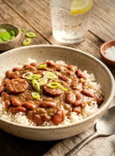 Red beans and rice on wooden table.
